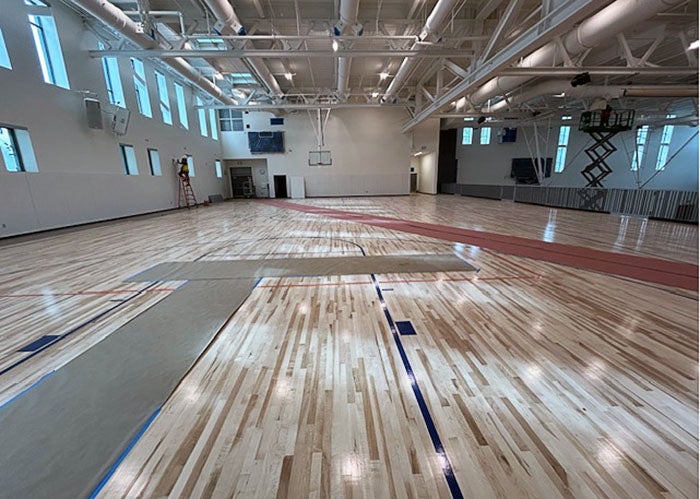 a hardwood floor in a gymnasium